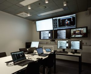 Med et enkelt drag and drop på Crestron touchpanelet styrer brugeren bl.a. sin præsentation.